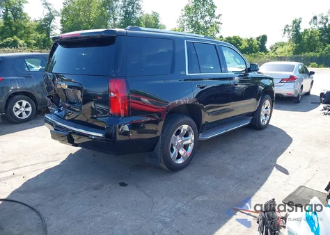 2015 Chevrolet Tahoe Ltz из США, поврежденный, VIN 1GNSKCKC3FR104845